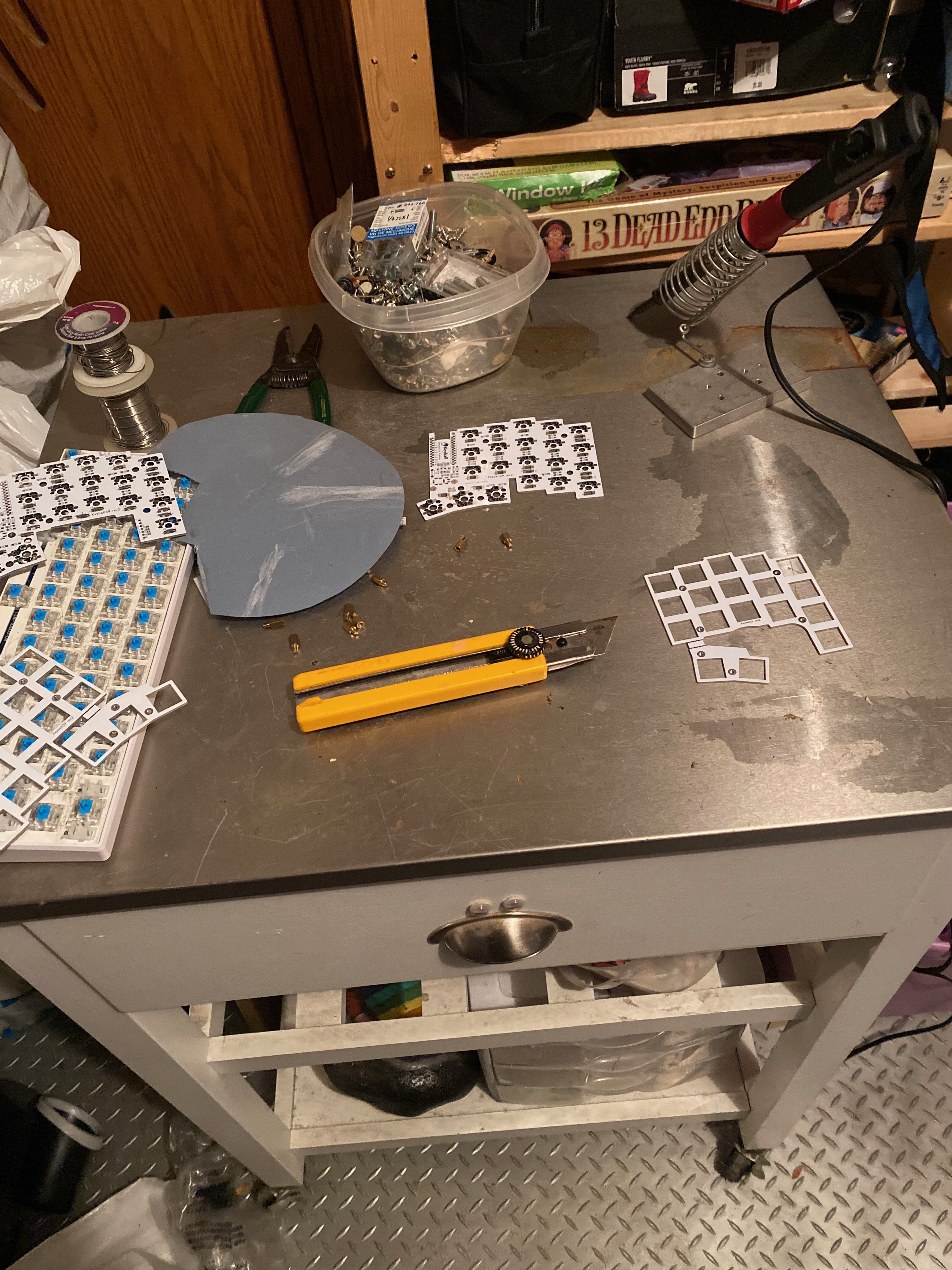Desk with keyboard parts, ready for the build